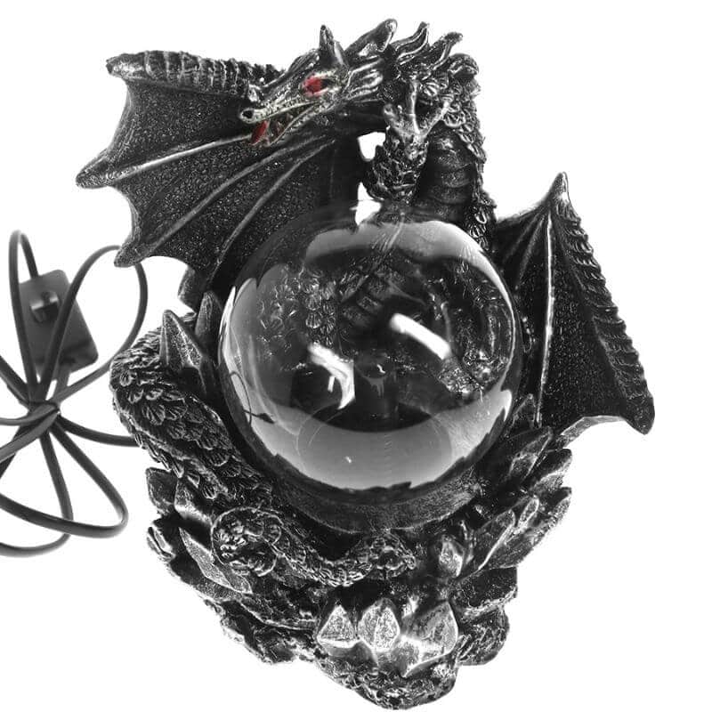 Dragon-shaped LED night light with a glass globe and detailed dragon design. Perfect for fantasy-themed decor and educational science gadgets.