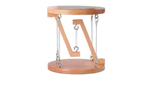 Wooden magnetic balance scale with metal chains and magnetic pendulum for educational science experiments and physics demonstrations.