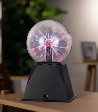 Tesla coil plasma ball displaying colorful electrical discharges inside a glass sphere on a black base, perfect for science education and decor.