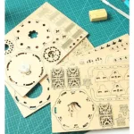 Wooden mechanical gear puzzle pieces for STEM educational projects and science decor, perfect for learning about gear mechanisms and engineering concepts.