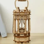 Intricate wooden hot air balloon model with detailed architectural design, perfect for science decor and educational displays.