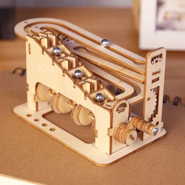 Wooden marble run puzzle with metal balls and tracks, ideal for STEM learning and science decor. Perfect educational toy for kids and adults to explore physics and engineering concepts.