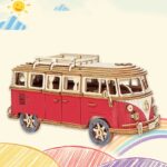 Vintage wooden toy camper van with a red body and natural wood accents, designed for educational play and decorative purposes.