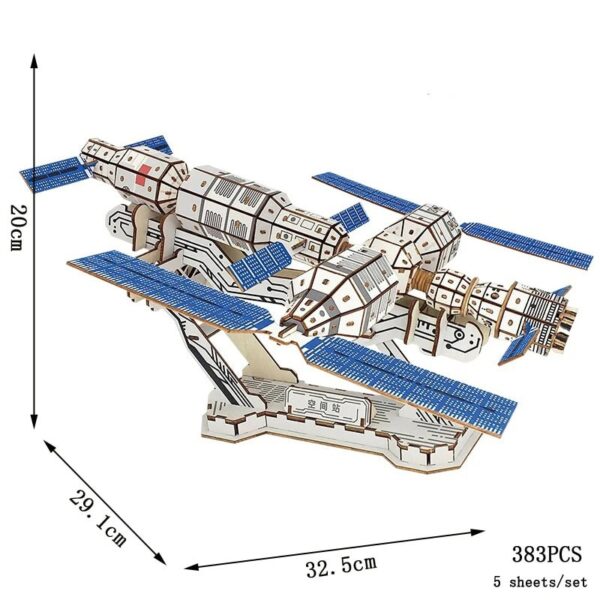 Detailed model of a space station with solar panels, made from educational building blocks, measuring approximately 20cm in height, 32.5cm in length, and 29.1cm in width.