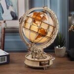 Intricate wooden globe clock with gears, showcasing a steampunk-inspired design for science enthusiasts and educational decor.