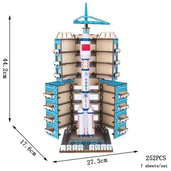 Detailed space rocket model with multiple storage compartments, perfect for educational purposes and space-themed decor. Made of wood and plastic, measuring 44.2cm tall, 27.3cm wide, and 17.6cm deep.