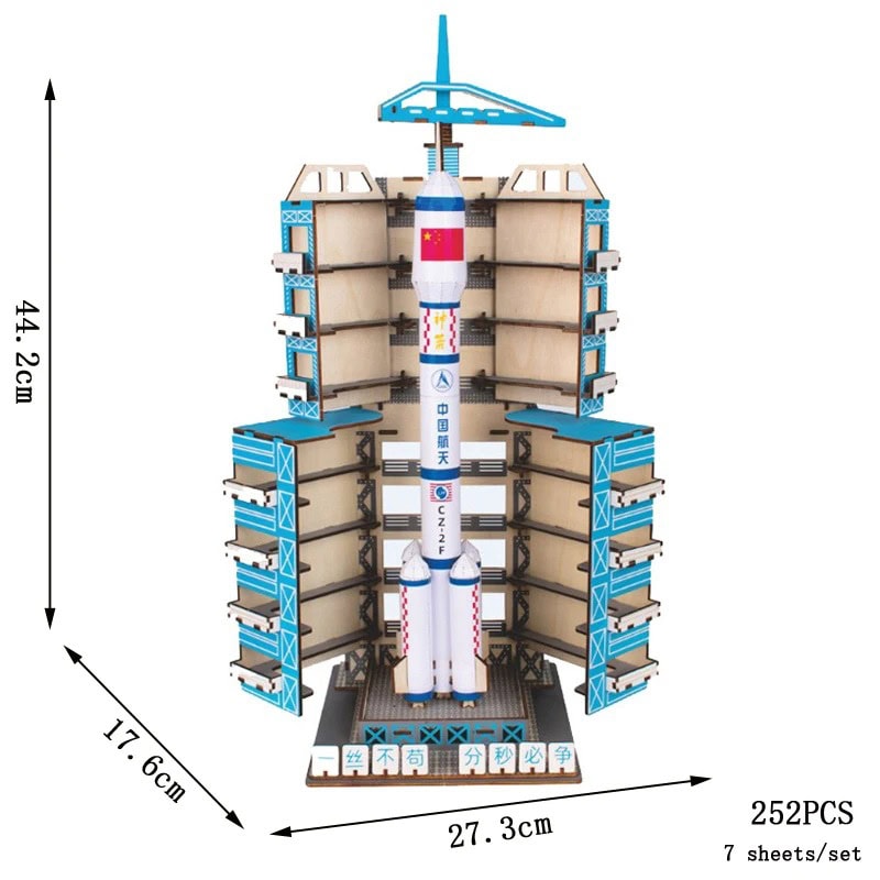 Space Rocket Model Kit for Educational Play and Decor Detailed space rocket model with multiple storage compartments, perfect for educational purposes and space-themed decor. Made of wood and plastic, measuring 44.2cm tall, 27.3cm wide, and 17.6cm deep.