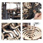 Intricate wooden marble run construction with gears, tracks, and spirals, showcasing a complex mechanical puzzle for educational and decorative purposes.