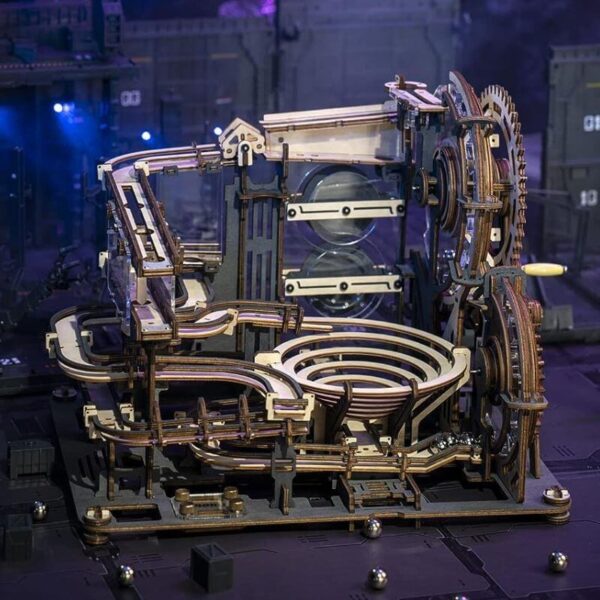 A detailed wooden mechanical clockwork model showcasing gears, levers, and intricate moving parts, perfect for science enthusiasts and educational purposes.