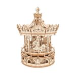 Wooden carousel model for educational and decorative purposes, showcasing intricate craftsmanship and detailed design. Perfect for science and art enthusiasts.