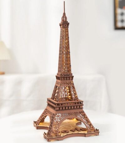 Detailed wooden puzzle model of the Eiffel Tower, perfect for educational and decorative purposes, showcasing intricate craftsmanship and design.