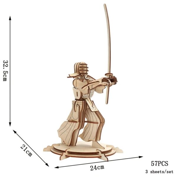 Wooden samurai warrior puzzle figure with detailed armor, holding a katana, standing on a circular base, measuring 32.5 cm tall, 24 cm wide, and 21 cm deep.