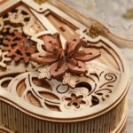 Intricate wooden butterfly mechanical puzzle with detailed cutouts, designed for educational and decorative purposes. Perfect for science and craft enthusiasts.