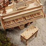 Detailed wooden miniature piano and matching bench model, perfect for educational decor and DIY science projects.