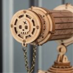 Wooden skull telescope model with intricate design, perfect for science-themed decor and educational purposes. Made of natural wood, showcasing craftsmanship and scientific curiosity.