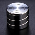 Stainless steel magnetic stirring bar used in laboratory experiments for mixing liquids efficiently.