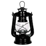 Oil lantern with metal frame and glass globe, ideal for outdoor camping and emergency lighting. Classic design featuring a handle for easy carrying and a wick for illumination.
