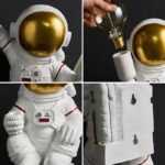 Astronaut figure holding a light bulb, demonstrating a science experiment with a space-themed toy.