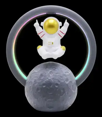 LED astronaut figure floating above a textured moon model with a colorful illuminated ring background.