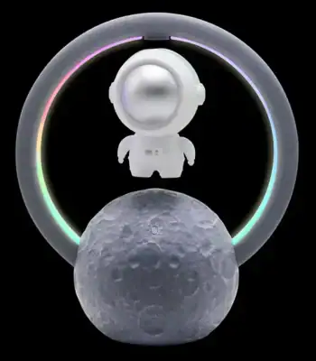 LED astronaut figure with colorful glow ring and moon model, perfect for science decor and educational purposes.