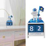 An educational space-themed desk calendar featuring a cute astronaut figure holding a flag, with a starry night backdrop and planetary details, perfect for science enthusiasts.