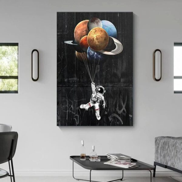 Astronaut holding balloons shaped like planets, creating a cosmic scene on a black background.