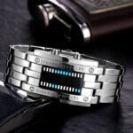 LED digital watch with a sleek metallic strap and modern design.