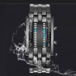 Modern digital watch with water resistance, featuring a sleek black design and illuminated display, perfect for sports and everyday wear.