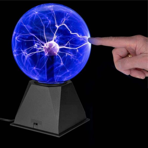 High-voltage Tesla coil with a hand interacting with the electric discharge.
