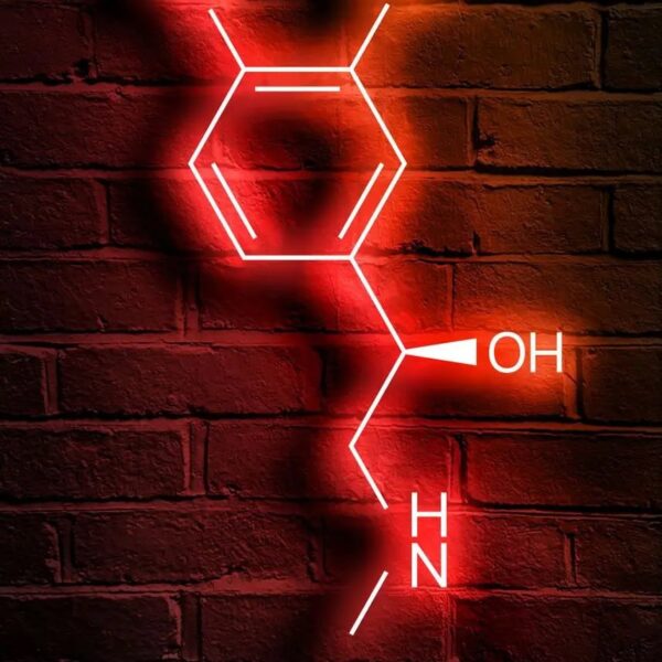 Neon sign of a caffeine molecule structure illuminated on a brick wall, showcasing chemical bonds and functional groups like hydroxyl and amine, ideal for science decor and educational displays.