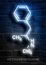Neon sign displaying the chemical structure of methamphetamine mounted on a dark brick wall, ideal for science-themed decor and educational settings.