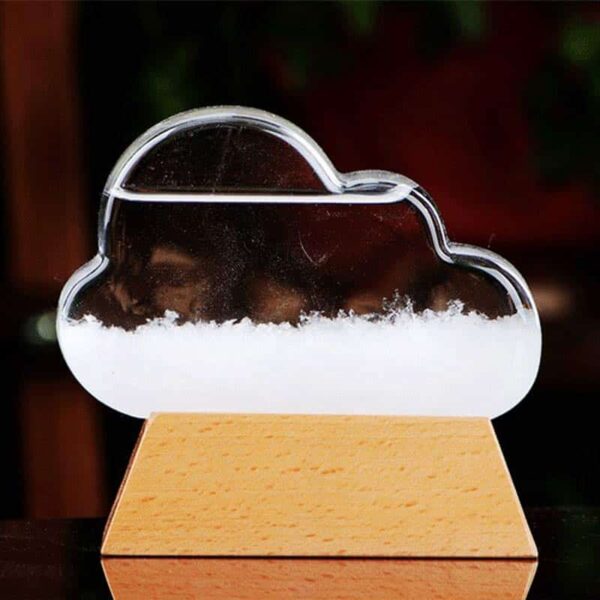 Clear acrylic cloud-shaped science decor with dry ice creating fog effect, mounted on a wooden base, ideal for educational displays and science-themed decor.
