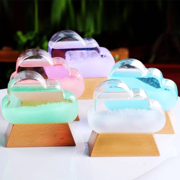 Brightly colored cloud-shaped bath bombs in pastel pink, purple, blue, and green, displayed on wooden stands. Perfect for a relaxing bath experience and fun educational science demonstrations.