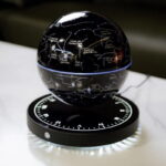 Interactive star map projector displaying celestial constellations and zodiac signs on a spherical surface, ideal for educational and decorative purposes.