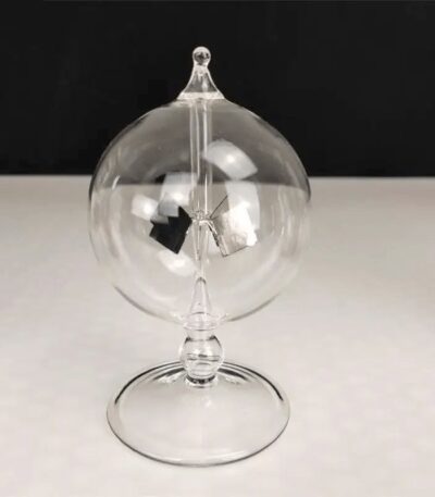Elegant glass globe with internal metallic components for science experiments and decor.