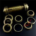Antique brass telescope parts with detailed engravings and rings, perfect for science decor or educational projects.
