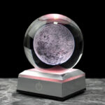 Moon globe LED lamp with realistic lunar surface details, perfect for science decor and educational purposes.