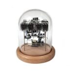 Decorative vintage vacuum tube display encased in a glass dome on a wooden base, ideal for science decor and educational purposes.
