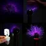 Tesla coil generating purple electrical arcs in a dark environment.