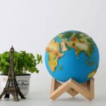 Earth globe model showcasing continents and oceans, ideal for educational purposes and home decor.