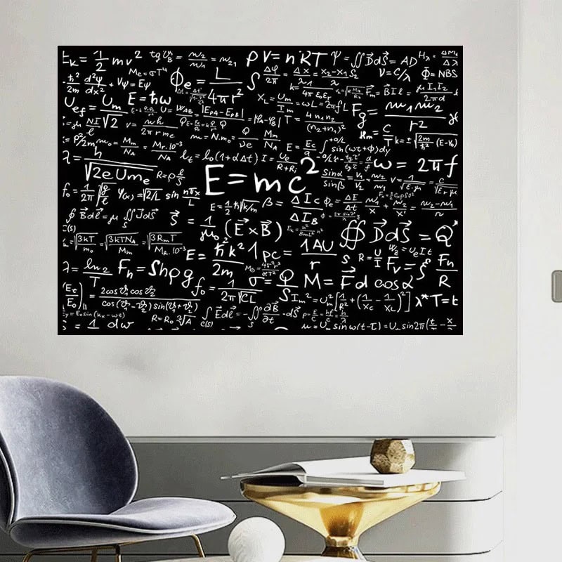 Physics equations and formulas written on a black chalkboard in a classroom setting.