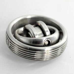 A metallic sphere gear puzzle with interlocking rings, showcasing intricate engineering and mechanical design. Perfect for science enthusiasts and educational purposes.