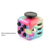 Colorful paint splatter design Rubik's Cube dice with black dots and sides, featuring a smooth black top and side buttons, ideal for educational and decorative purposes.