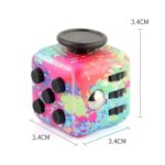 Vibrant splash paint design Rubik's Cube with black rotating sides, perfect for brain teasers and educational fun for children and adults.