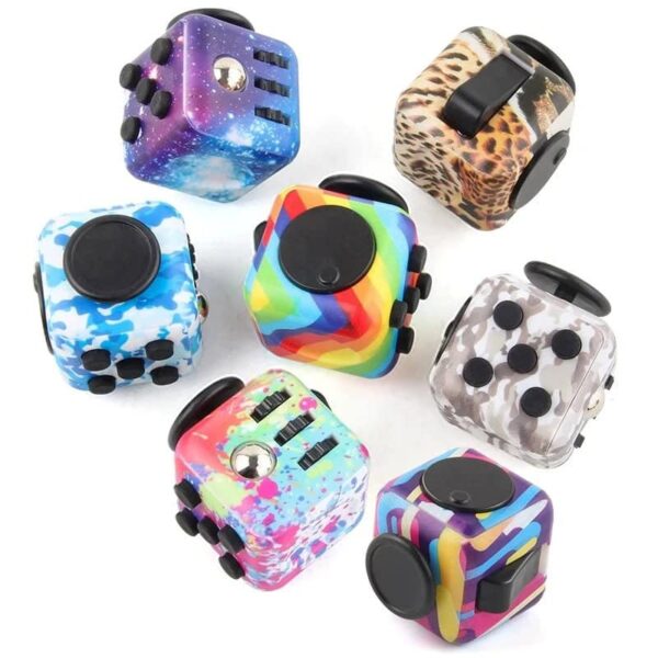 Unique fidget toys featuring vibrant designs, multiple buttons, switches, and dials for tactile engagement and focus enhancement.