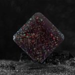 Colorful Glitter Resin Cube for Science Decor and Educational Projects.