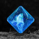 A luminous blue geometric crystal with intricate internal structures, glowing vividly against a dark background, showcasing a mesmerizing science-inspired design.