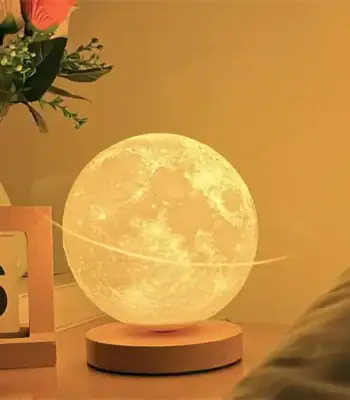 Realistic moon-shaped LED lamp with detailed lunar surface, perfect for bedroom decor, night lighting, or educational purposes.