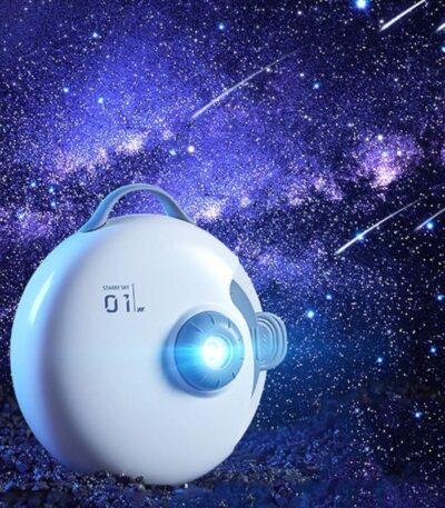 Starry sky projector displaying a vibrant galaxy with shooting stars against a dark night sky. Perfect for science-themed decor and educational entertainment for children and adults.