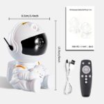 Astronaut Nebula Projector with remote, USB cable, and instruction manual, designed for educational and decorative use, measuring 12.5 cm tall and 8.5 cm wide.